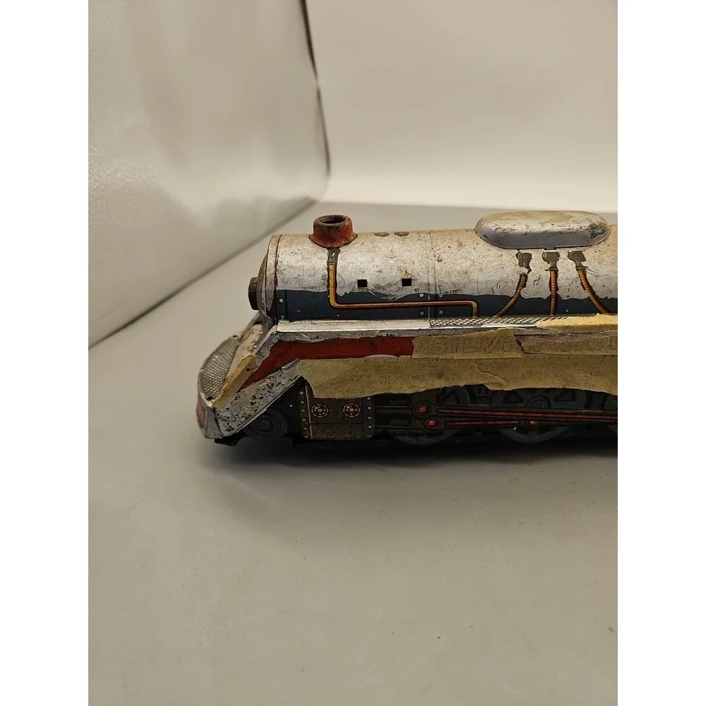 Vintage Over Lane Express and Silver Mountain Tin Train Engines‎